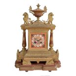 A French porcelain inset ormolu mantel clock Unsigned   A French porcelain inset ormolu mantel clock