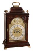 A George III mahogany table clock with pull-quarter repeat on six bells...   A George III mahogany