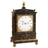 A Regency brass inlaid ebonised bracket clock Edwards, London   A Regency brass inlaid ebonised