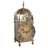 A Victorian brass lantern clock Unsigned, mid to late 19th century The five...   A Victorian brass