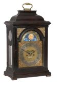 A rare ebonised Dutch striking bracket clock with moonphase and alarm Signed...   A rare ebonised