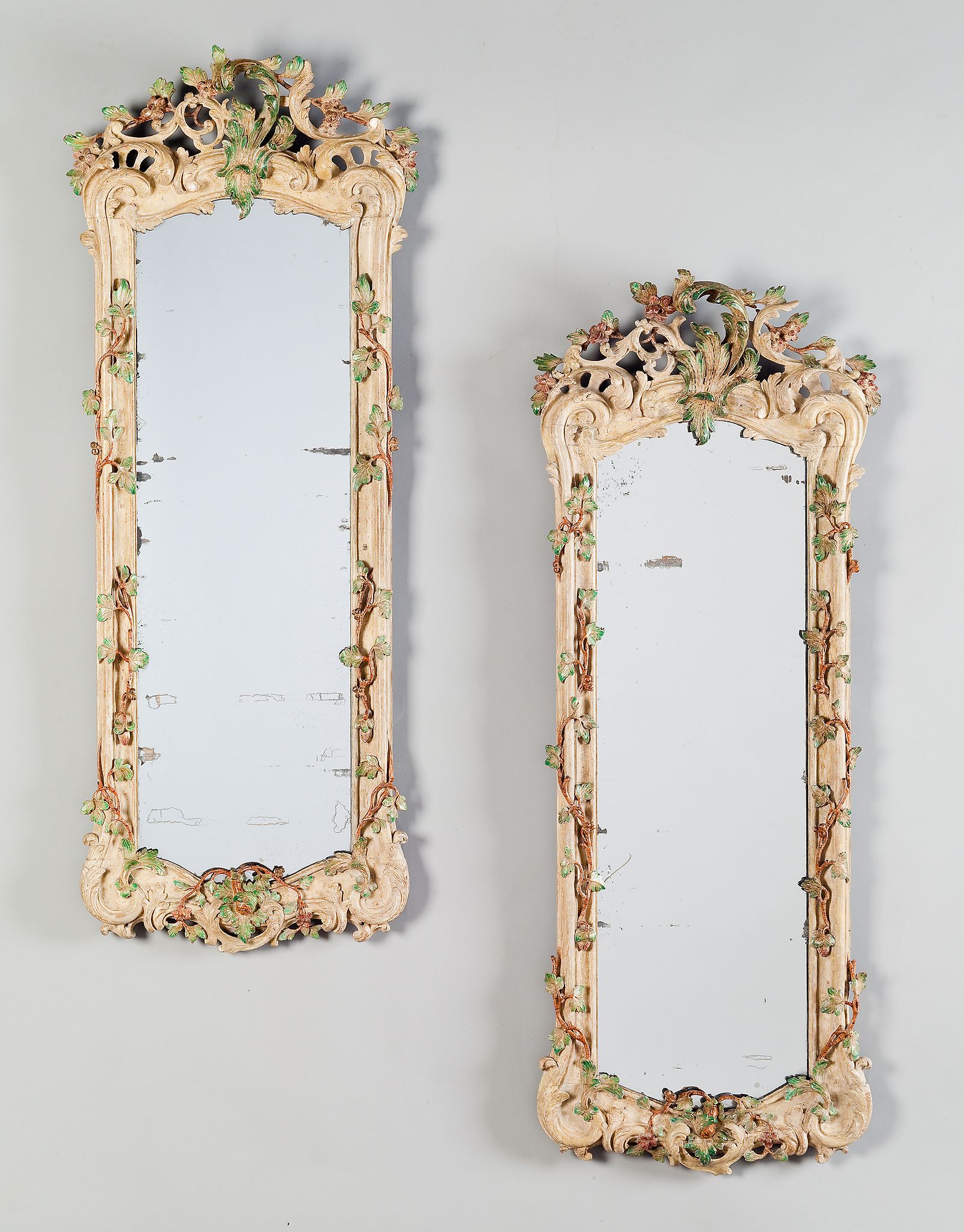A Pair of 18th Century Painted German Rococo Girandoles carved with high relief scrolls forming a