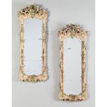 A Pair of 18th Century Painted German Rococo Girandoles carved with high relief scrolls forming a