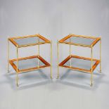 A Pair of Fiddleback Mahogany and Brass Two Tier Tables with bevelled glass shelves and fiddleback