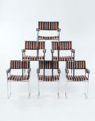 A Set of 10 'Square' Armchairs by Willy Rizzo with polished stainless steel frames covered in Paul