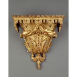 A Pair of Giltwood Wall Brackets one mid-18th century, the other a modern copy, the rectangular tops