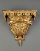 A Pair of Giltwood Wall Brackets one mid-18th century, the other a modern copy, the rectangular tops