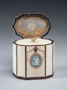 A George III Gold-Mounted Ivory and Toirtoiseshell Tea Caddy the hinged lid with gold ring handle