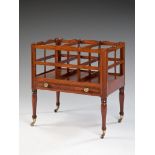 A Large Regency Mahogany Canterbury with three divisions, the top shaped rail and sides of trellis