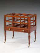 A Large Regency Mahogany Canterbury with three divisions, the top shaped rail and sides of trellis