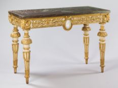 An 18th Century Sicilian Parcel Gilt Side Table the original marble top above a central oval