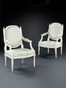 A Set of Four Louis XVI Fauteuils the rectangular shaped backs with detailed acanthus leaf carving
