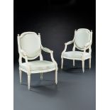 A Set of Four Louis XVI Fauteuils the rectangular shaped backs with detailed acanthus leaf carving