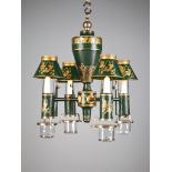 A Charles X Tole Chandelier in green with gilt decoration, retaining the original glass drip pans,