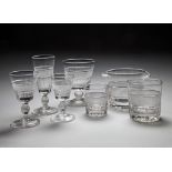 A 19th Century Cut Glass Table Service for fourteen place settings, including glasses for champagne,