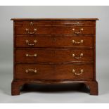 A Mahogany Serpentine Chest of Drawers A Mahogany Serpentine Chest of Drawers