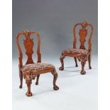 A Pair of 19th Century Walnut Child's Chairs A pair of George II style carved walnut child's chairs,