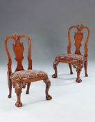 A Pair of 19th Century Walnut Child's Chairs A pair of George II style carved walnut child's chairs,
