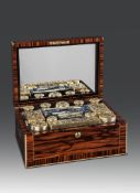 A Victorian Calamander Dressing Case by Asprey the interior lined with dark blue leather,