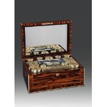 A Victorian Calamander Dressing Case by Asprey the interior lined with dark blue leather,