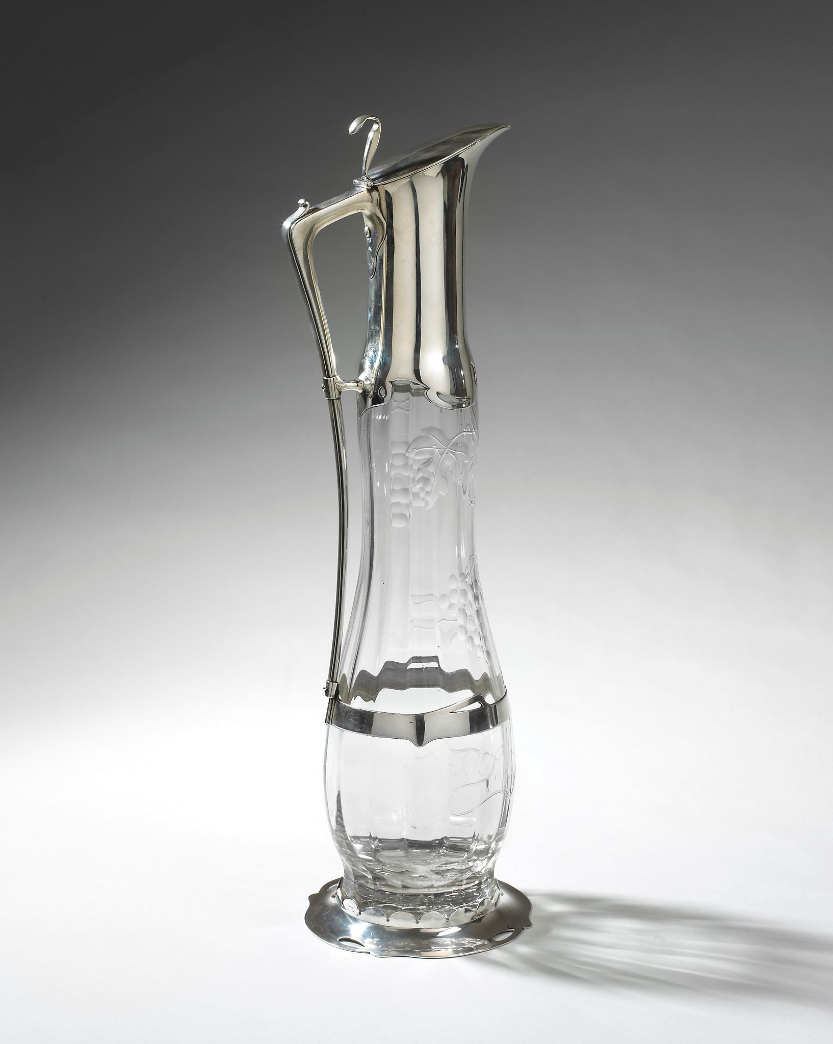 An Art Nouveau Double Magnum Claret Jug engraved with vine decoration 58cm high, 17cm diameter