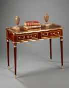 A Louis XVI Mahogany Bureau Plat the rounded rectangular top with a pierced brass gallery and a