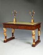 A French Empire Rosewood bureau plat by Molitor the top with a pair of leather covered slides and