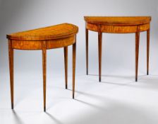 A Pair of George III Satinwood and Marquetry Card Tables the D-shaped tops inlaid with scrolling