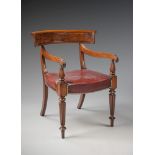 A Set of Ten Regency Mahogany Dining Chairs including a pair of armchairs, the curving back rests