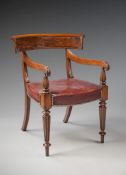 A Set of Ten Regency Mahogany Dining Chairs including a pair of armchairs, the curving back rests