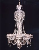 A Late Regency Cut-Glass Eight-Light Chandelier the scalloped and fan cut vase shaped corona and