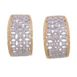 A pair of diamond earrings, the pierced curved panels set with brilliant cut... A pair of diamond