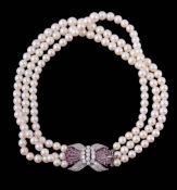 A three row cultured pearl, diamond and ruby necklace A three row cultured pearl, diamond and ruby