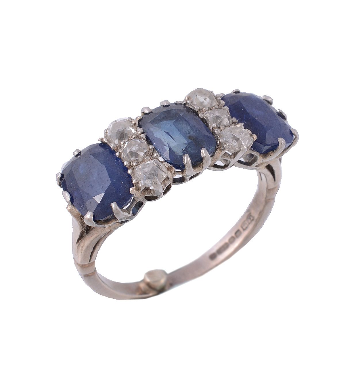 An 18 carat gold sapphire and diamond ring An 18 carat gold sapphire and diamond ring, the three