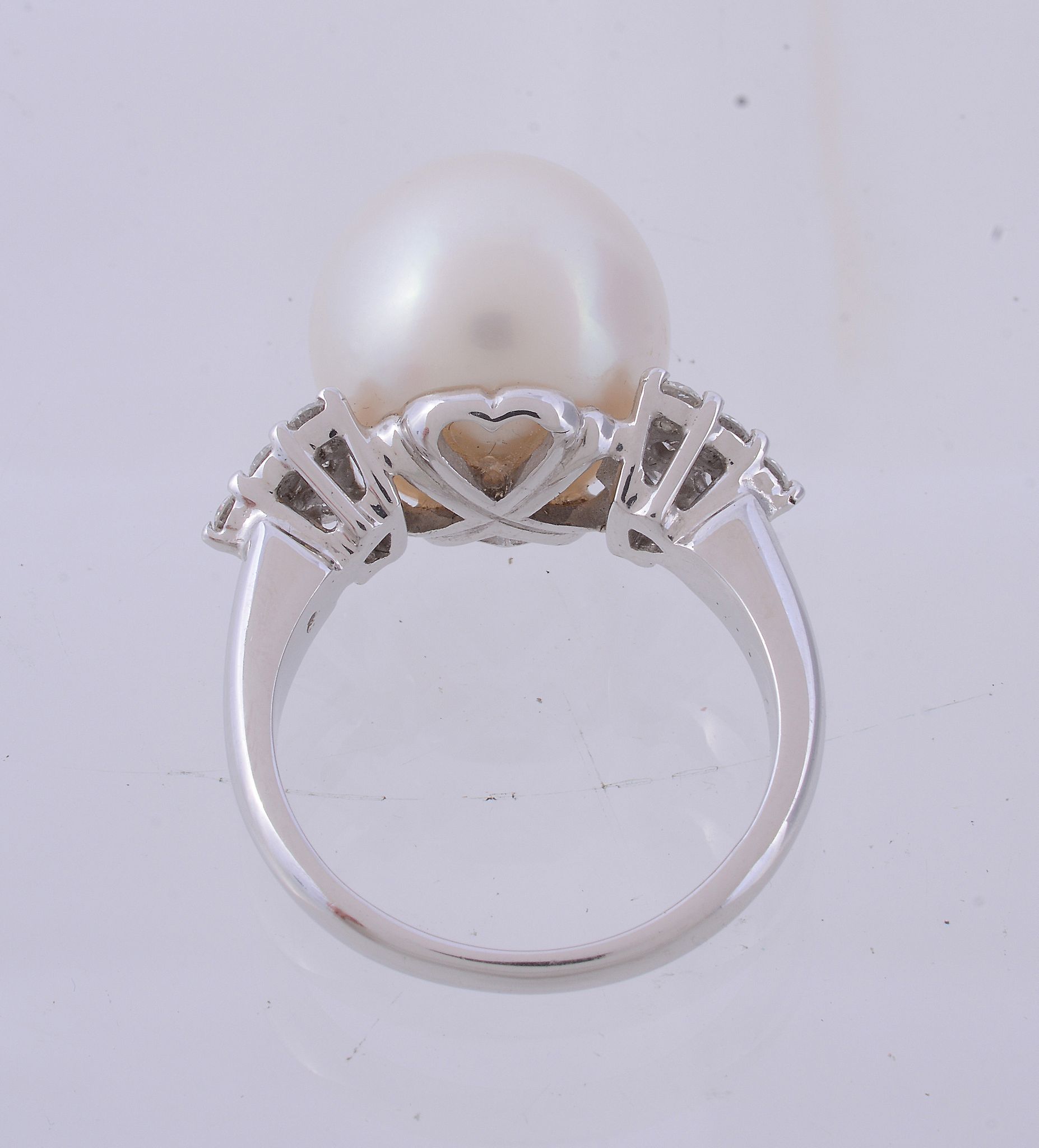 A South Sea cultured pearl and diamond ring A South Sea cultured pearl and diamond ring, the central - Image 3 of 3