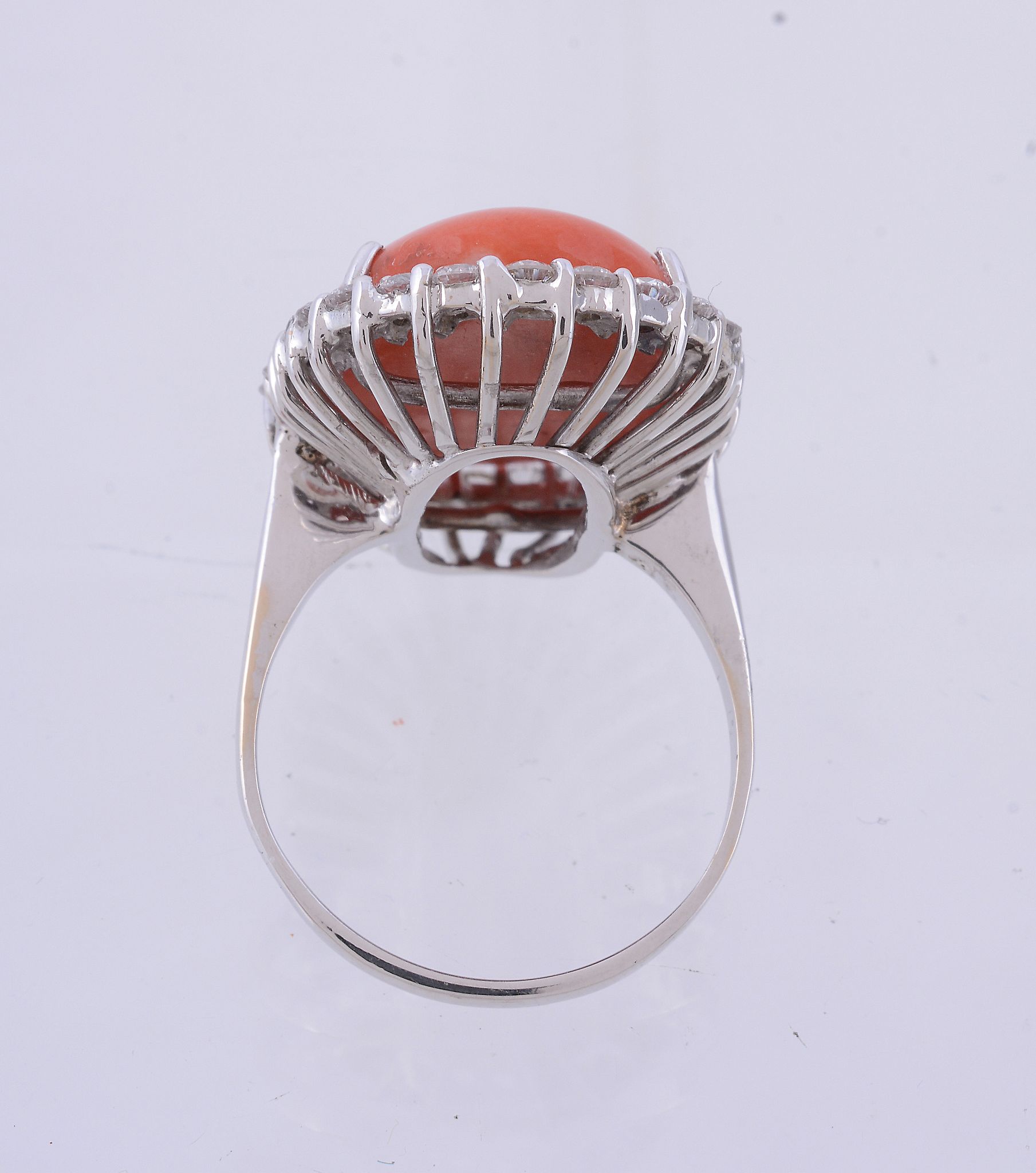A coral and diamond ring, the oval cabochon coral claw set within a surround... A coral and - Image 3 of 3