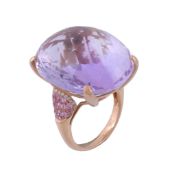 An amethyst, pink sapphire and diamond ring An amethyst, pink sapphire and diamond ring, the central