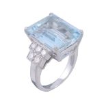 An aquamarine and diamond ring, the central rectangular cut aquamarine claw... An aquamarine and