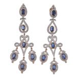 A pair of sapphire and diamond ear pendents A pair of sapphire and diamond ear pendents, the