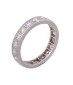 A diamond eternity ring , set with twenty brilliant cut diamonds A diamond eternity ring , set