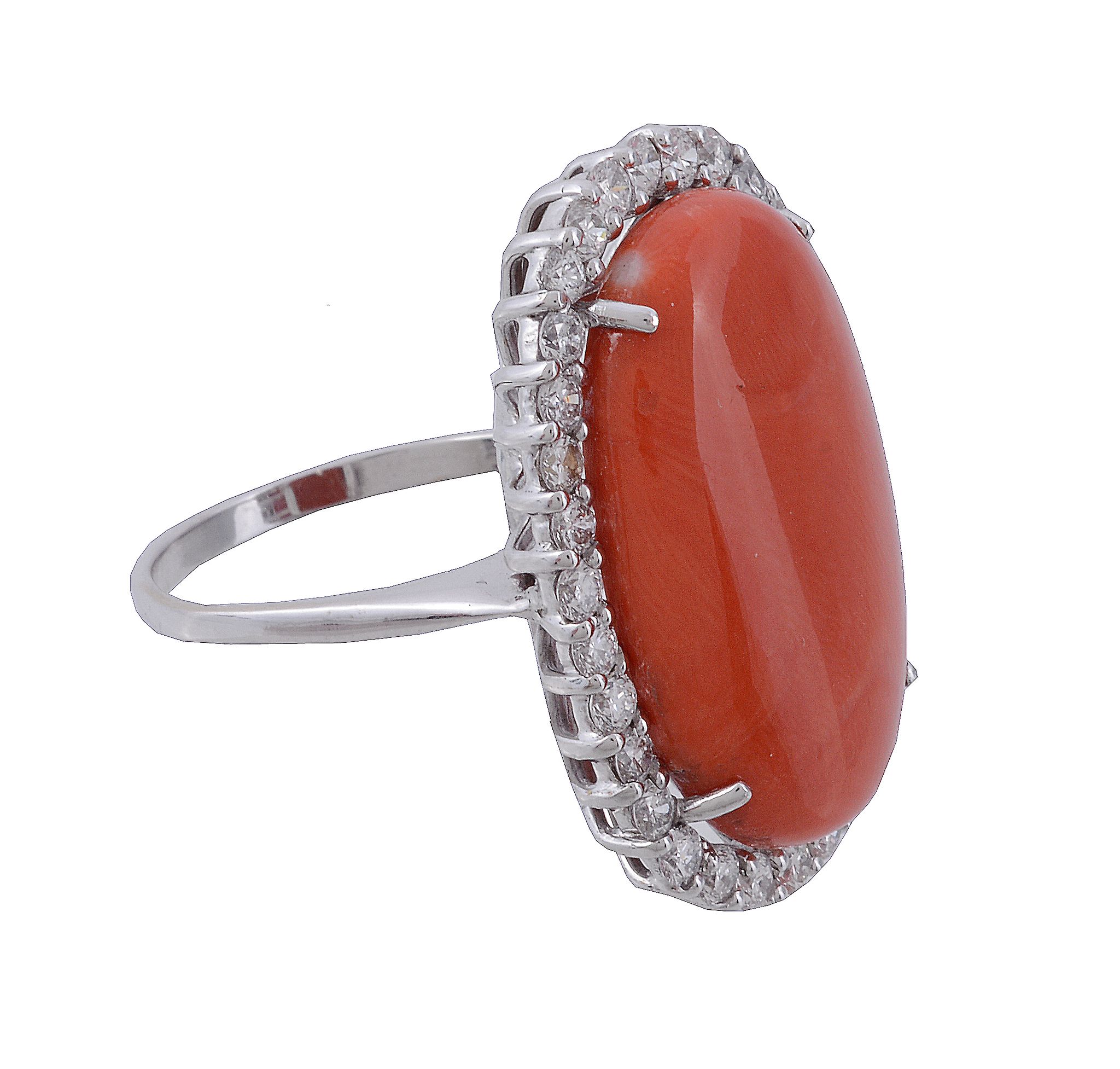 A coral and diamond ring, the oval cabochon coral claw set within a surround... A coral and - Image 2 of 3