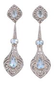 A pair of aquamarine and diamond earrings A pair of aquamarine and diamond earrings, the pear cut