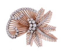 A 1950s diamond brooch, designed as a fern, set with brilliant cut diamonds A 1950s diamond