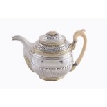 A Russian silver parcel gilt oval baluster tea pot, maker's mark HL or JH A Russian silver parcel