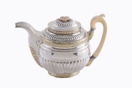 A Russian silver parcel gilt oval baluster tea pot, maker's mark HL or JH A Russian silver parcel