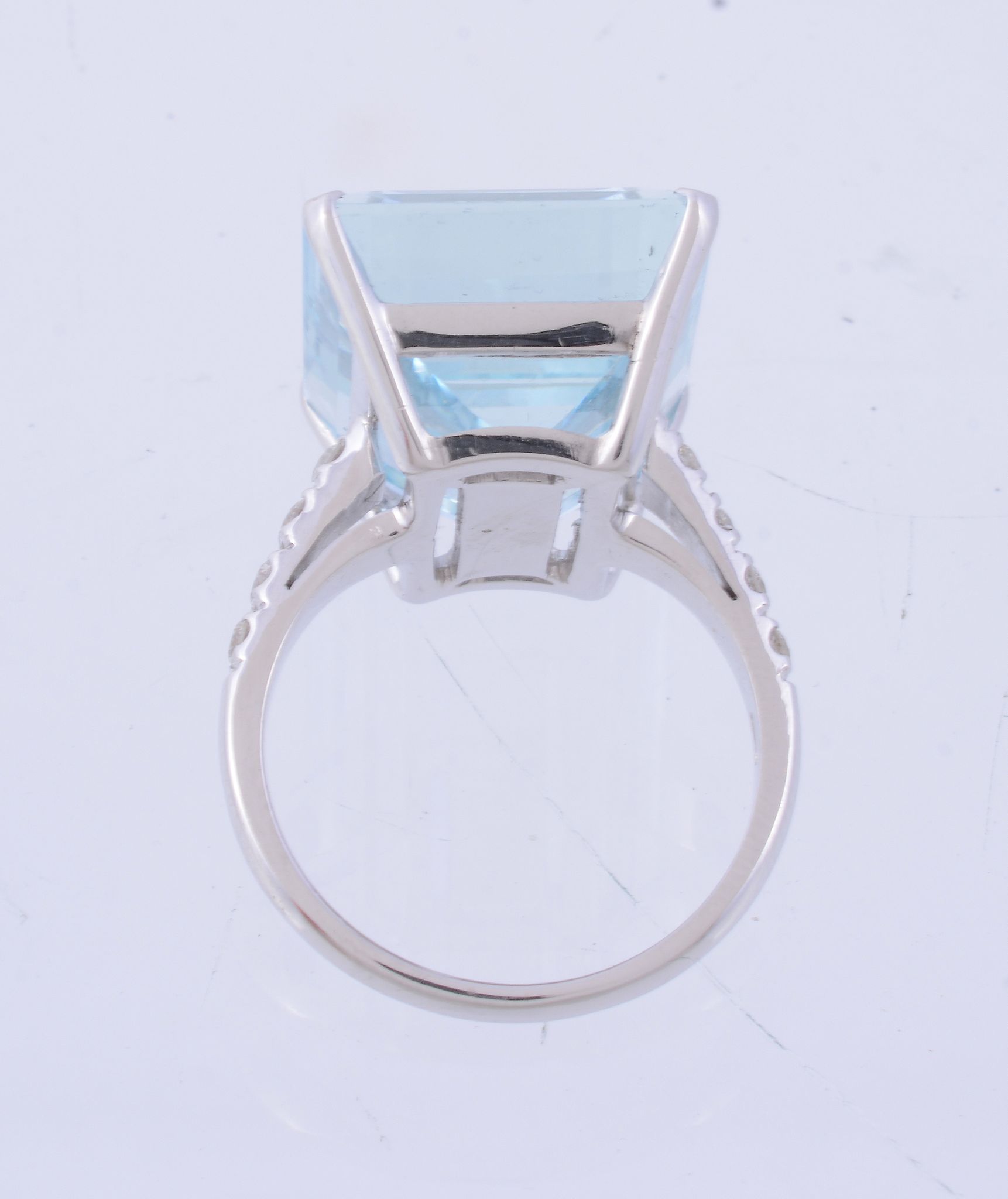 An aquamarine and diamond ring, the rectangular step cut aquamarine in a... An aquamarine and - Image 3 of 3