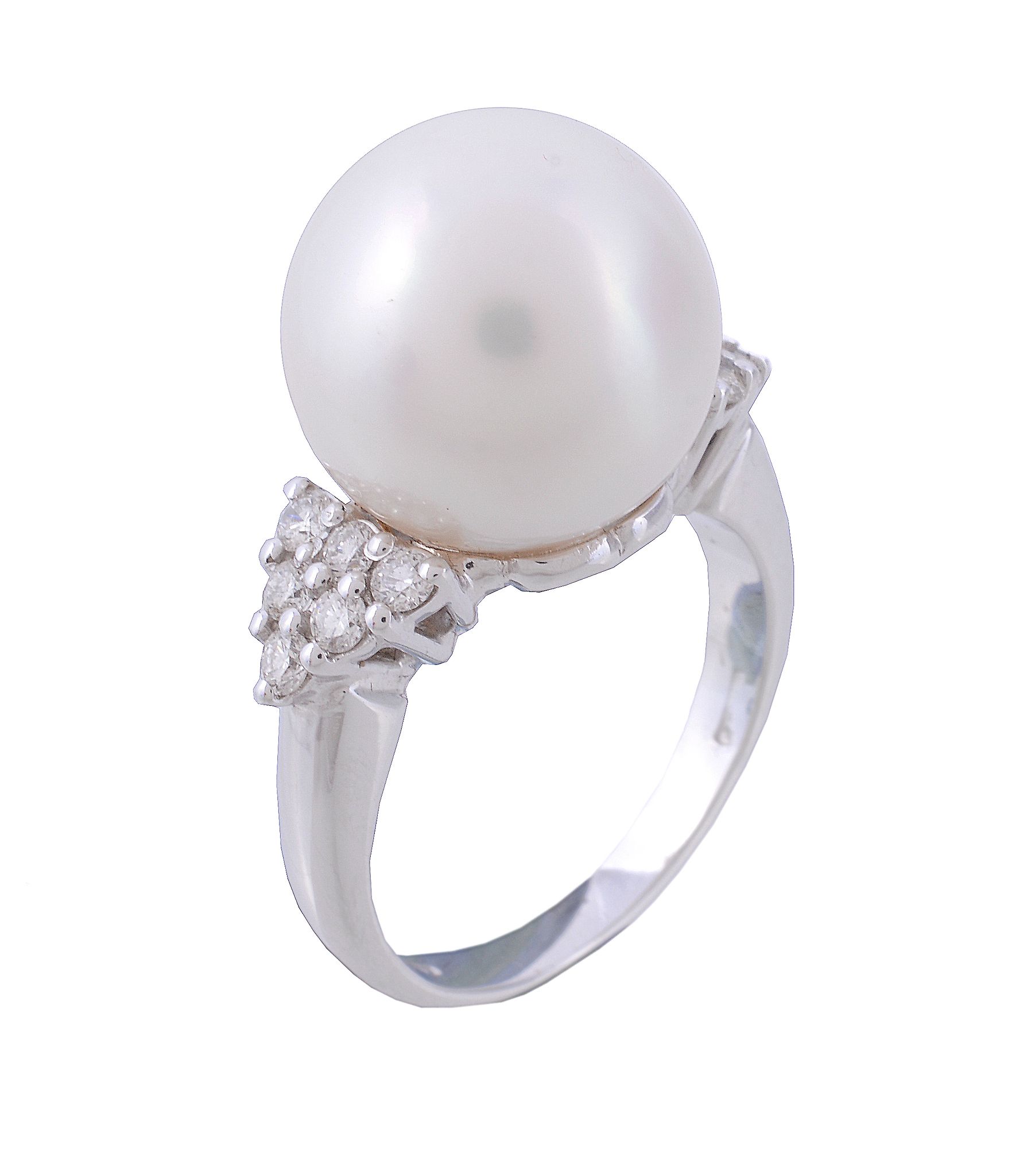 A South Sea cultured pearl and diamond ring A South Sea cultured pearl and diamond ring, the central