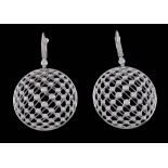 A pair of diamond earrings, the circular lattice panels set with brilliant... A pair of diamond