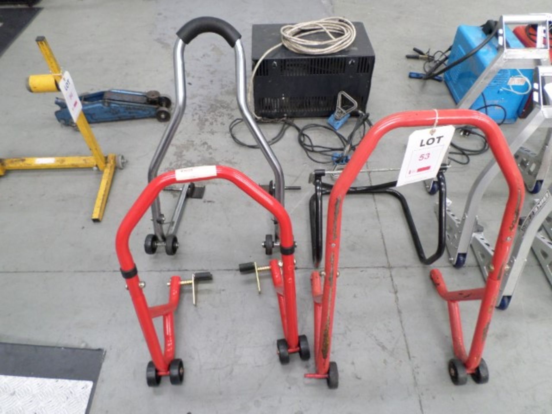4 assorted motorcycle paddock stands