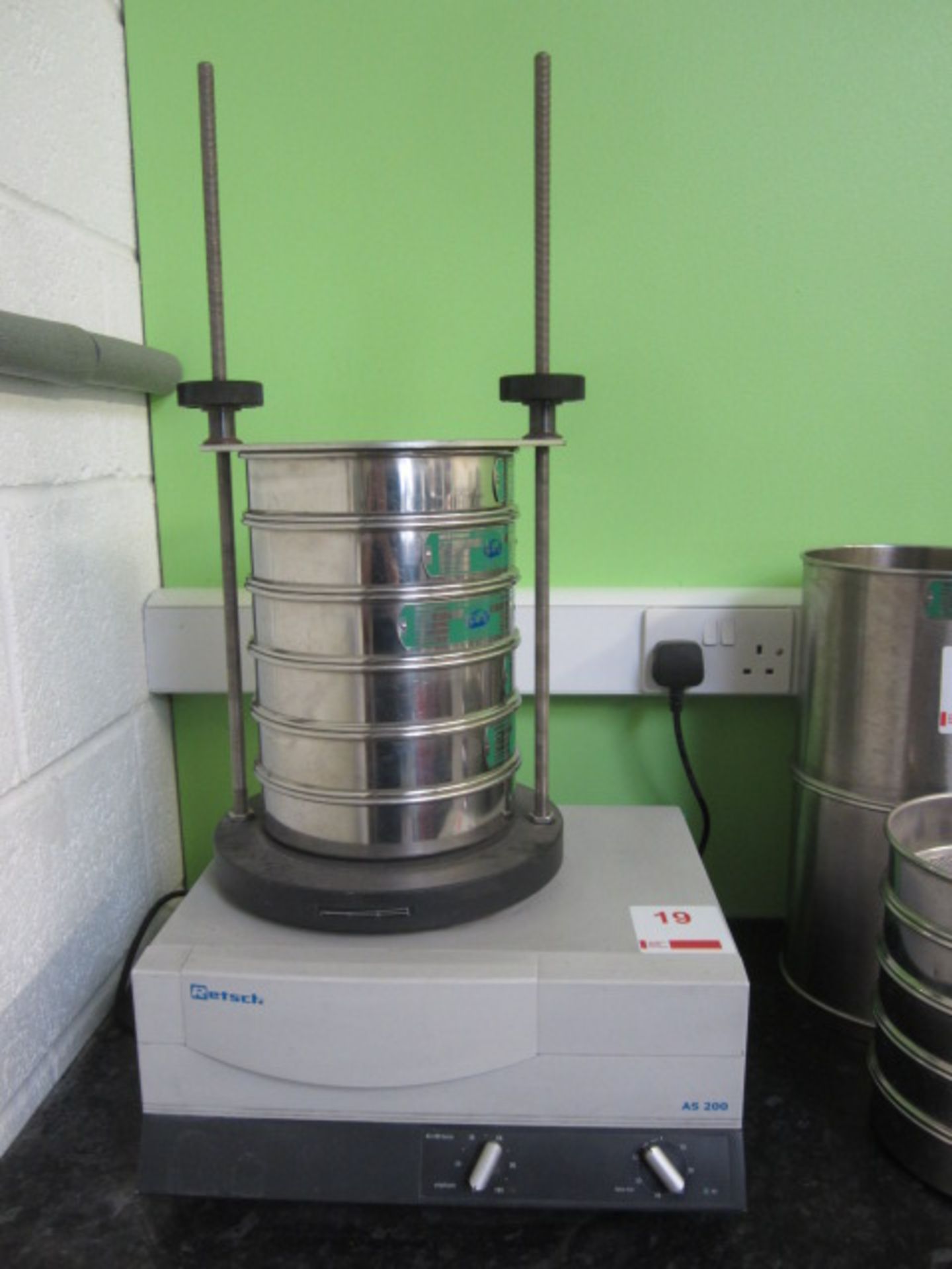 Retsch AS200 sieve shaker, serial number 12102502041 with 5 x stainless steel graded test sieves,